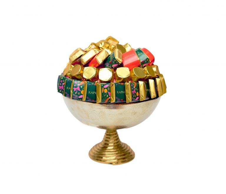 E-commerce product photography of a gold pedestal bowl filled with luxury chocolates in Liverpool