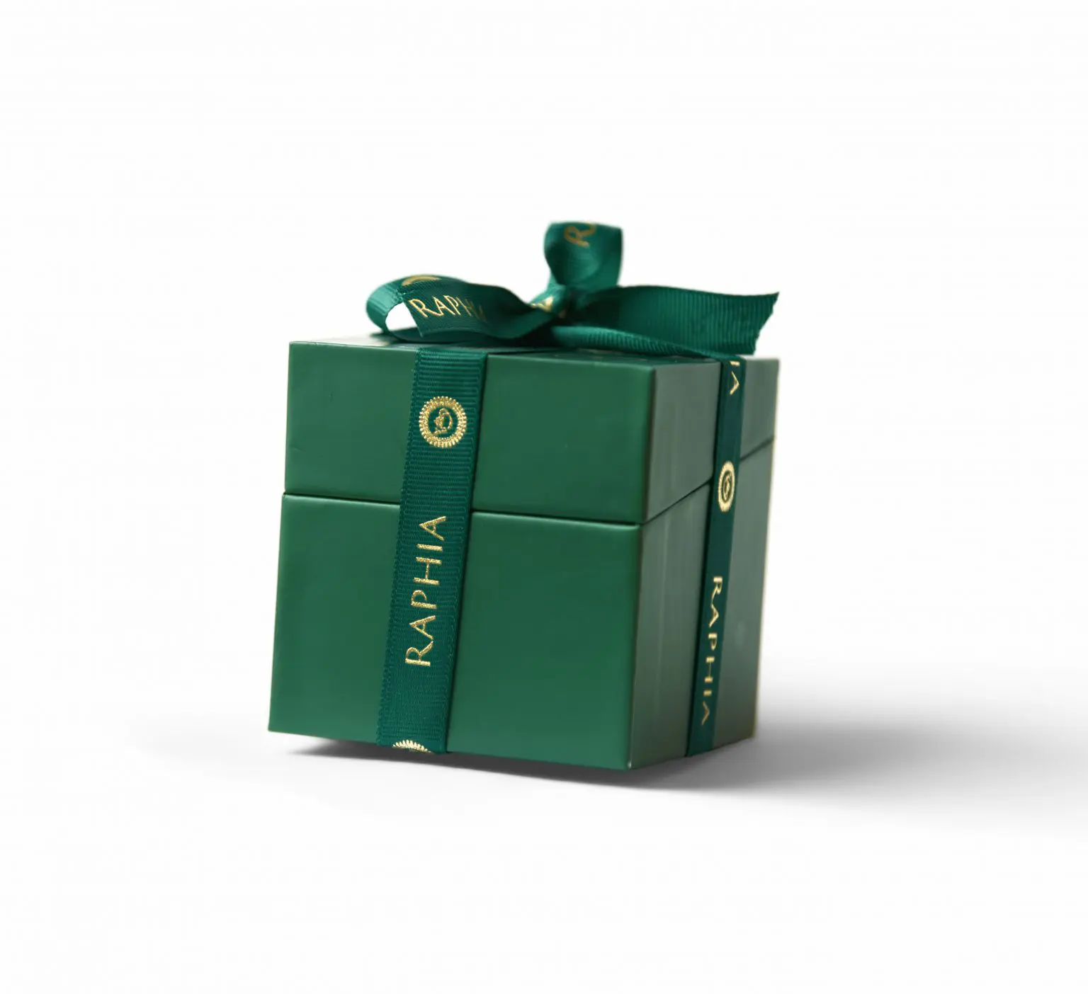 Green Raphia chocolate gift box tied with a ribbon, ecommerce product photography in Liverpool