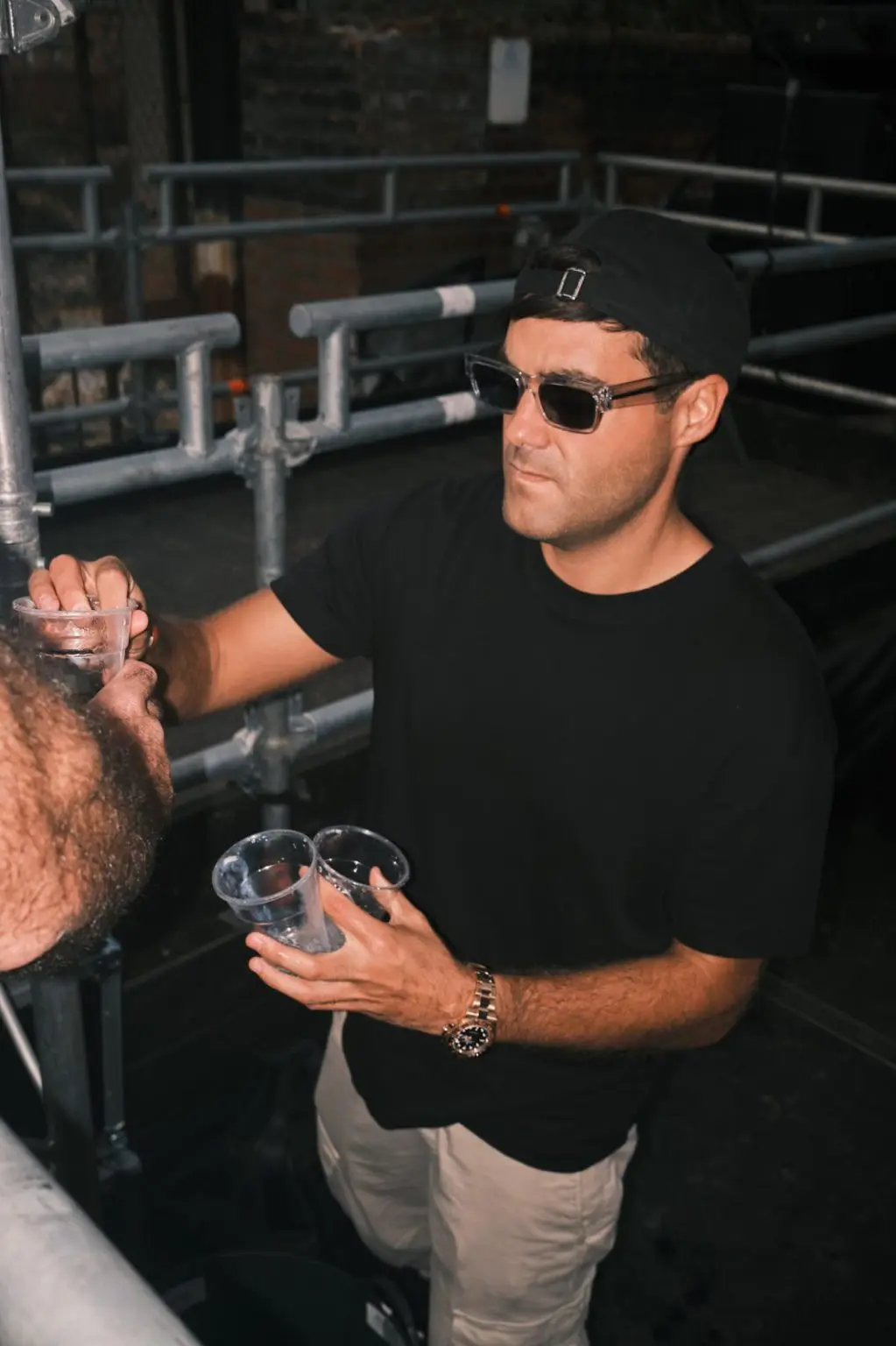 Behind the scenes with DJ Huzey at an open air music event in Liverpool
