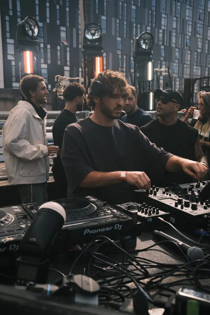 Close up of hands on the decks during a DJ set at a Liverpool music event