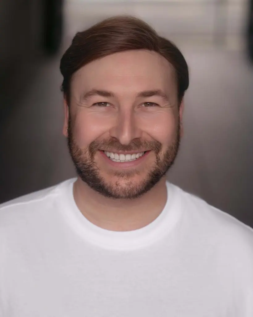 Smiling LinkedIn headshot of a professional man, Liverpool corporate headshot session by Captured By Luke Media