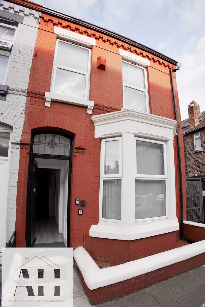 Red-brick terraced house exterior photographed for a Liverpool property listing